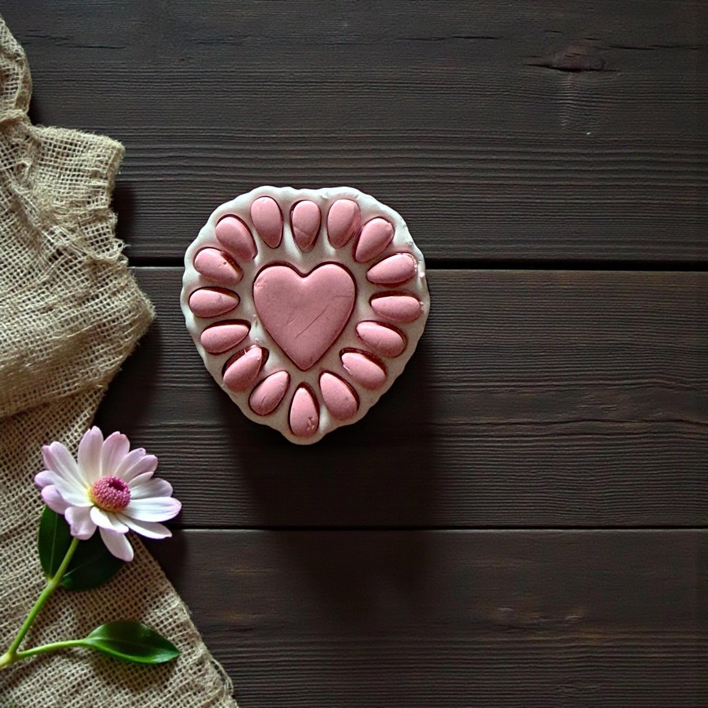 finished pink heart petal clay design with flower