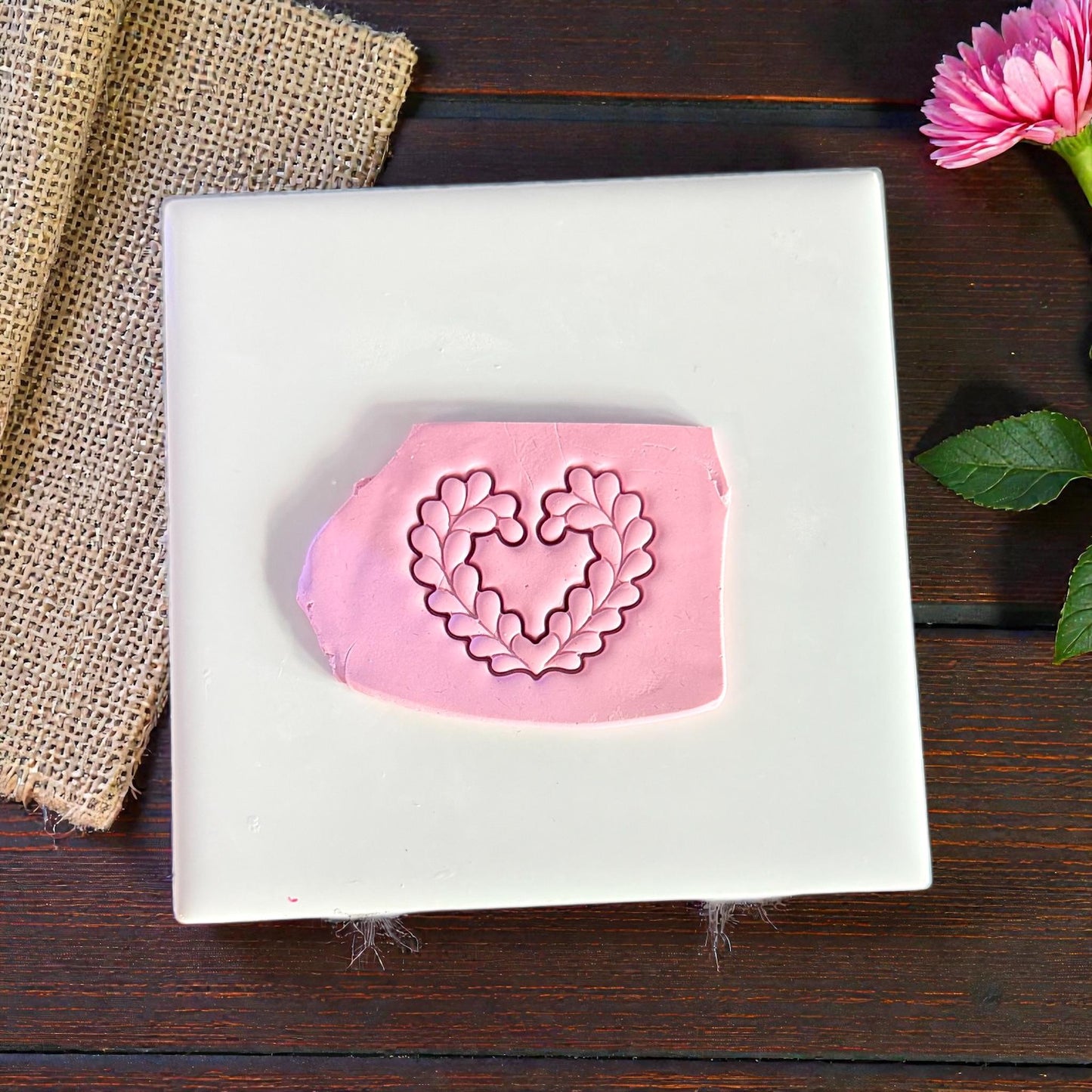 heart wreath polymer clay impression on pink clay