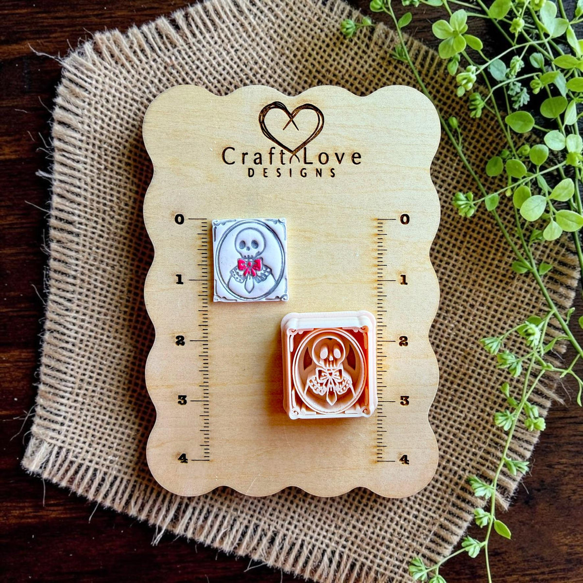 CraftLove Designs display board featuring the finished skeleton cameo and matching polymer clay cutter with size reference.