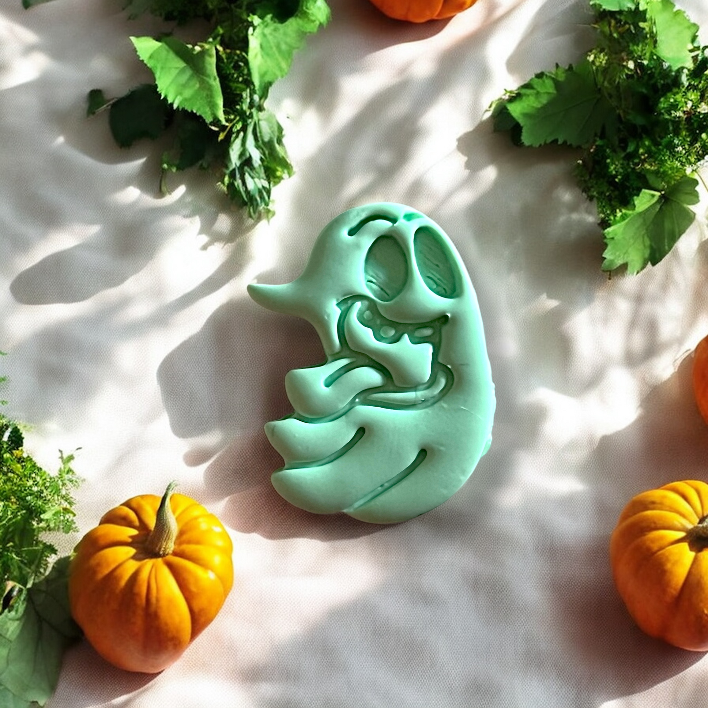 Detail shot of Silly Ghost earring-size cut in soft lighting and fall setting