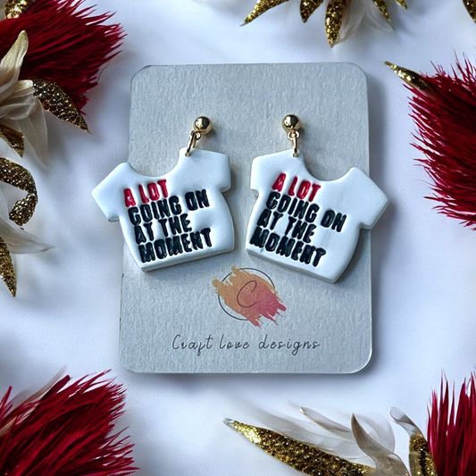 A Lot Going On at the Moment" earrings in red and black, displayed on a Craft Love Designs card. Bold and playful design. 