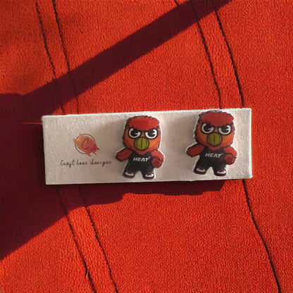 Bernie Team SPIRIT Mascot stud earrings showcasing the Miami Heat mascot in vibrant red and yellow. Perfect for game day or Heat fans. (Characters: 141)