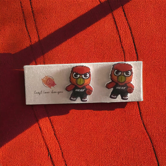 Bernie Team SPIRIT Mascot stud earrings showcasing the Miami Heat mascot in vibrant red and yellow. Perfect for game day or Heat fans. (Characters: 141)