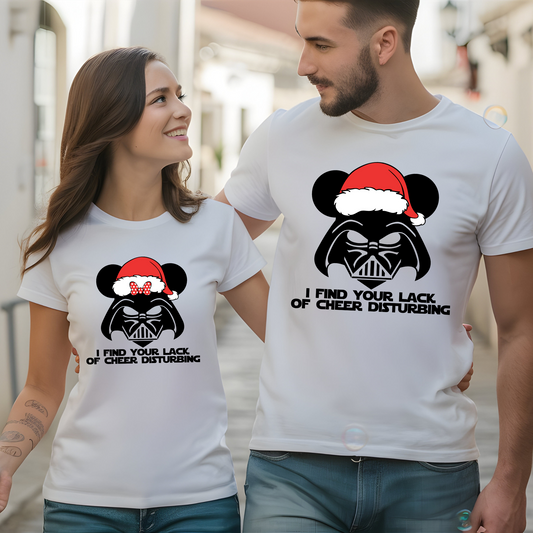 A couple wearing matching white t-shirts with a Darth Vader-inspired design, mouse ears, and a Santa hat, perfect for the holiday season.