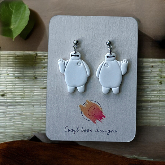 Robot character-inspired polymer clay dangle earrings with waving design, displayed on a Craft Love Designs card.
