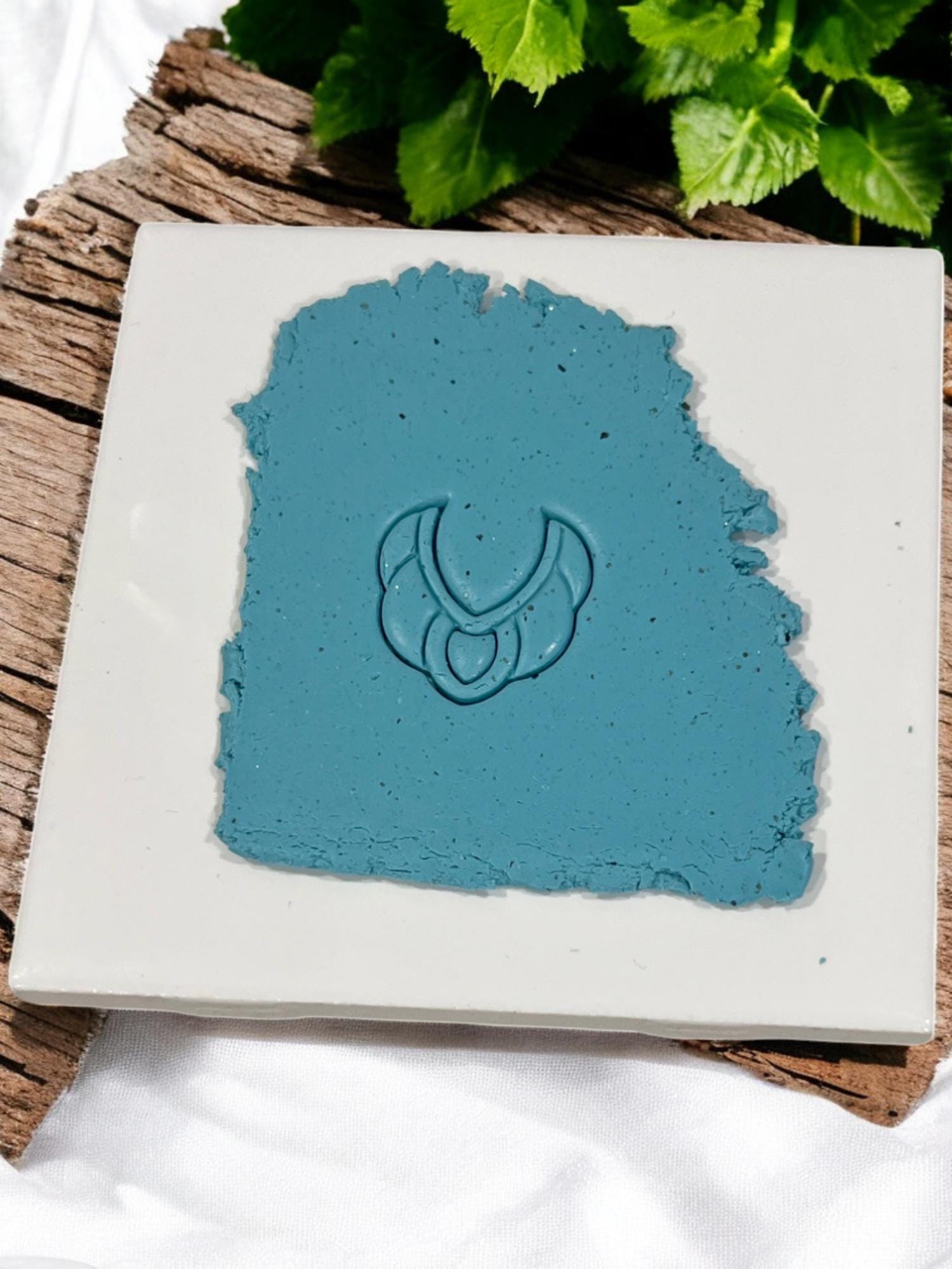 Clay slab with full embossed crescent fan shape