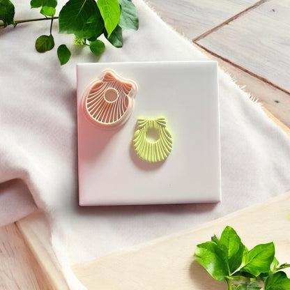 shell bow clay imprint