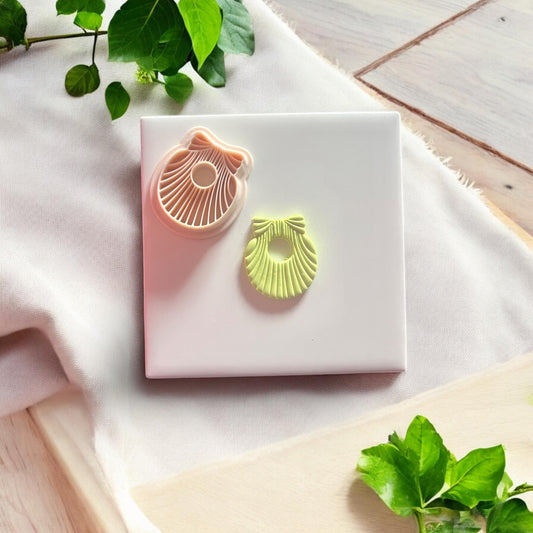 shell bow clay imprint