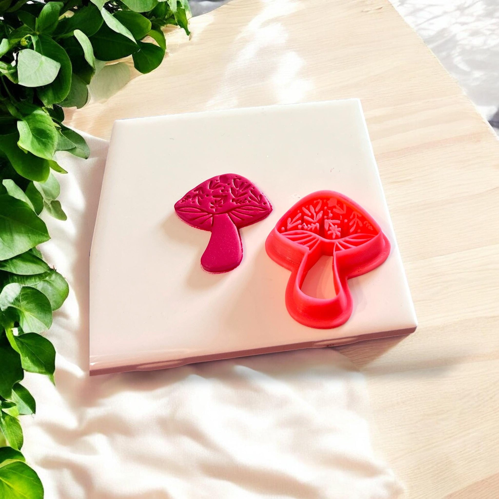mushroom clay piece and red cutter