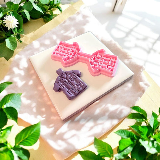 purple clay piece with pink shirt cutter