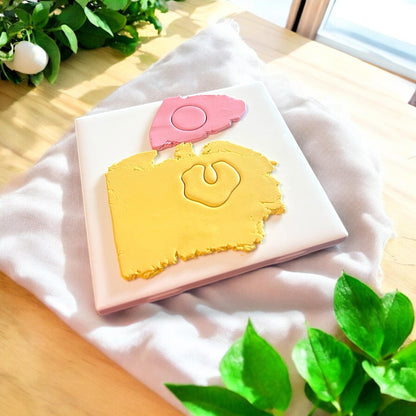 polymer clay slab with two cutouts