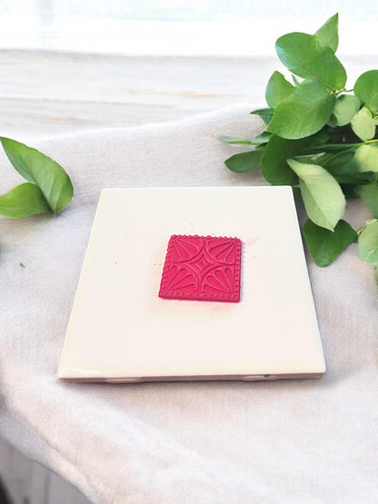 Square floral boho design cutout in polymer clay for earring making