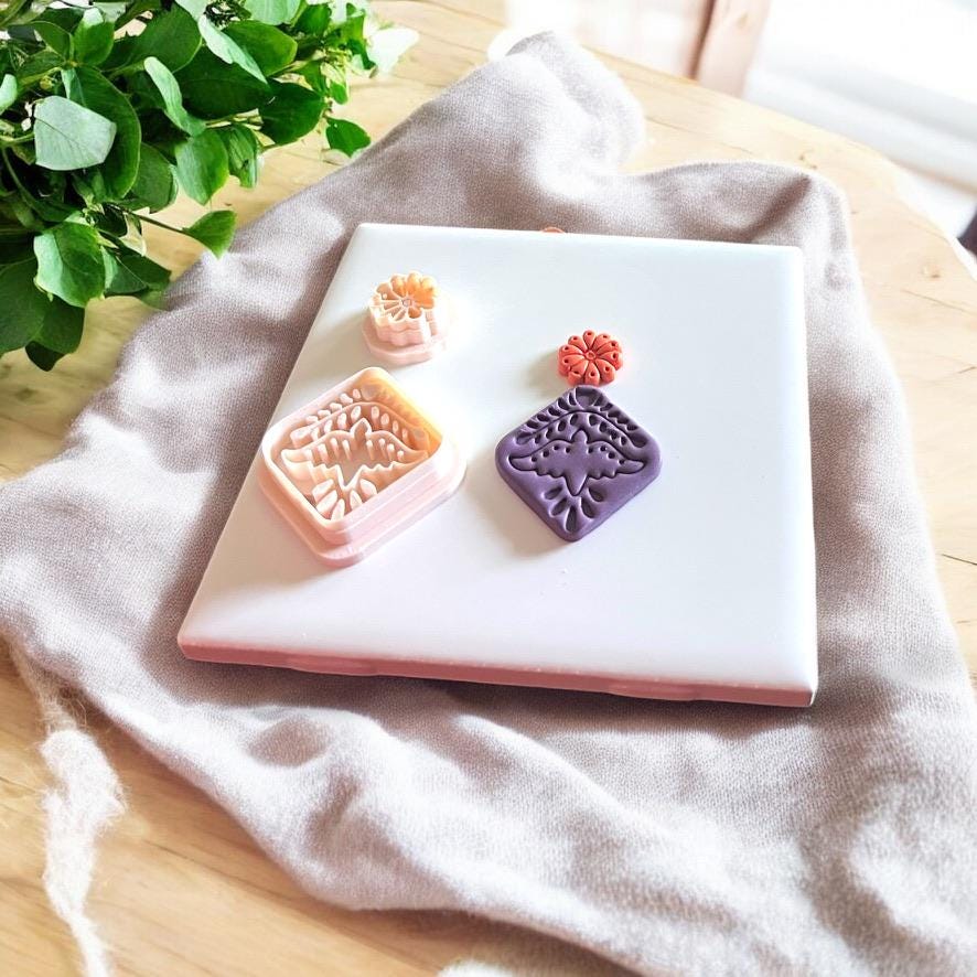Complete boho bird and flower stud polymer clay cutter set with detailed impressions shown on clay