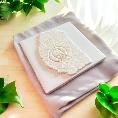 sun hat imprint in clay