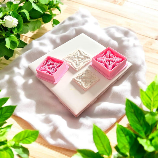 beige clay tile cuts with two matching pink cutters