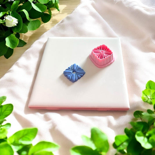 blue clay flower with pink square cutter