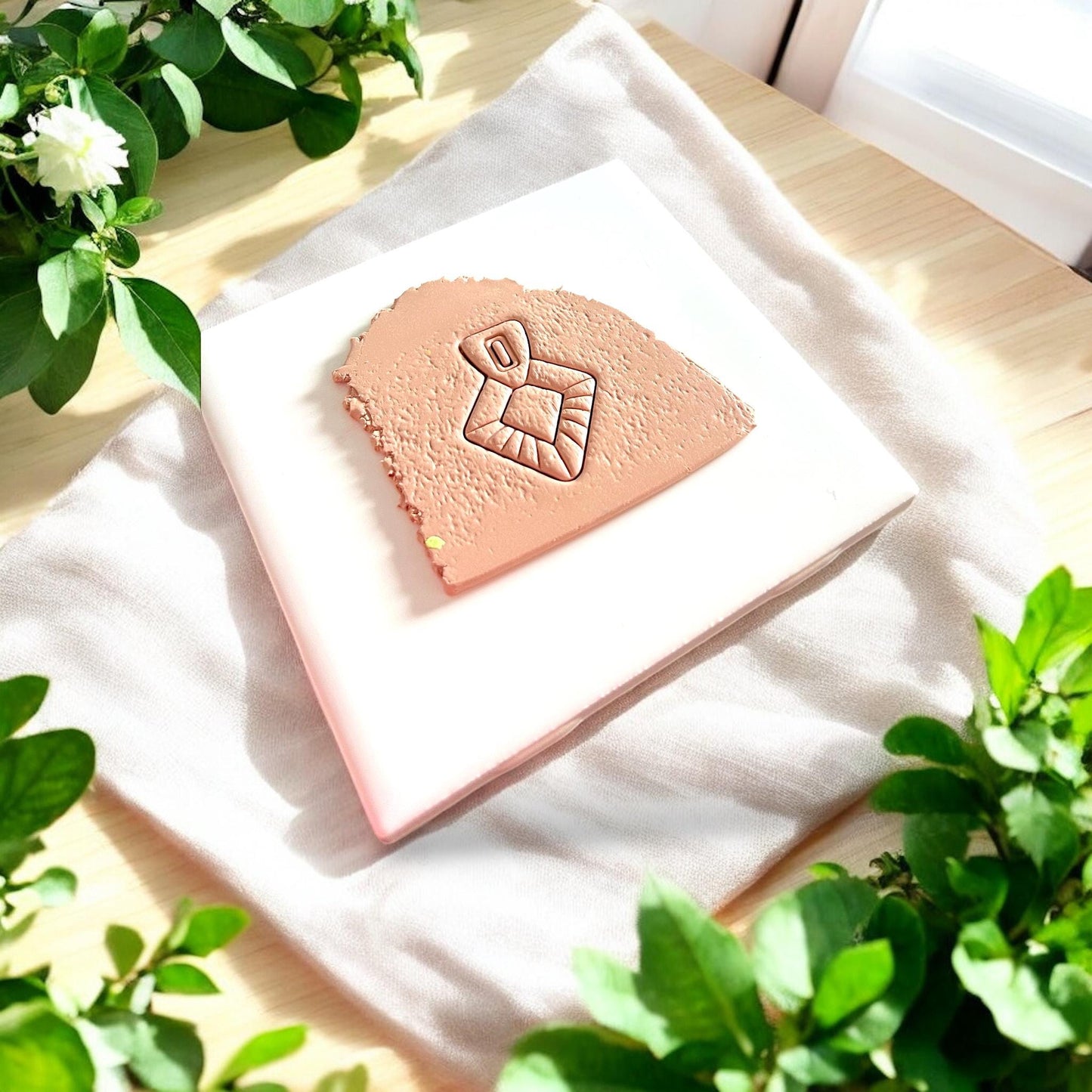 peach clay slab with boho fan pendant imprint