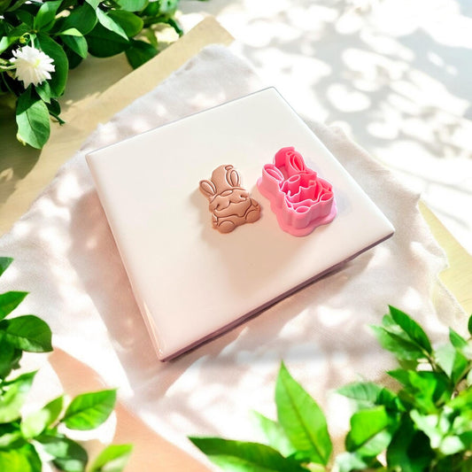 clay bunny beside pink cutter