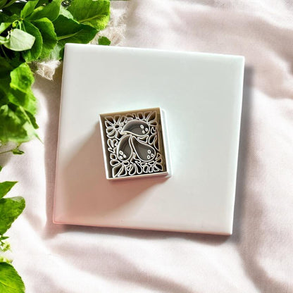 Top view of polymer clay cutter in ghost Matisse shape with floral spooky detail and compact