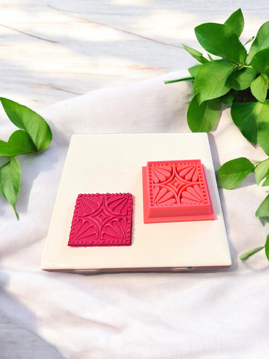 Polymer clay earring cutter and red floral boho clay imprint