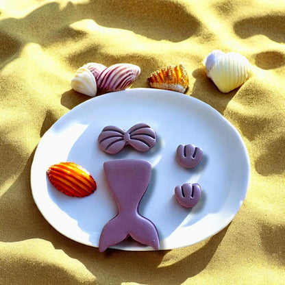 Mermaid tail polymer clay cutter mold, perfect for beach-themed earrings.