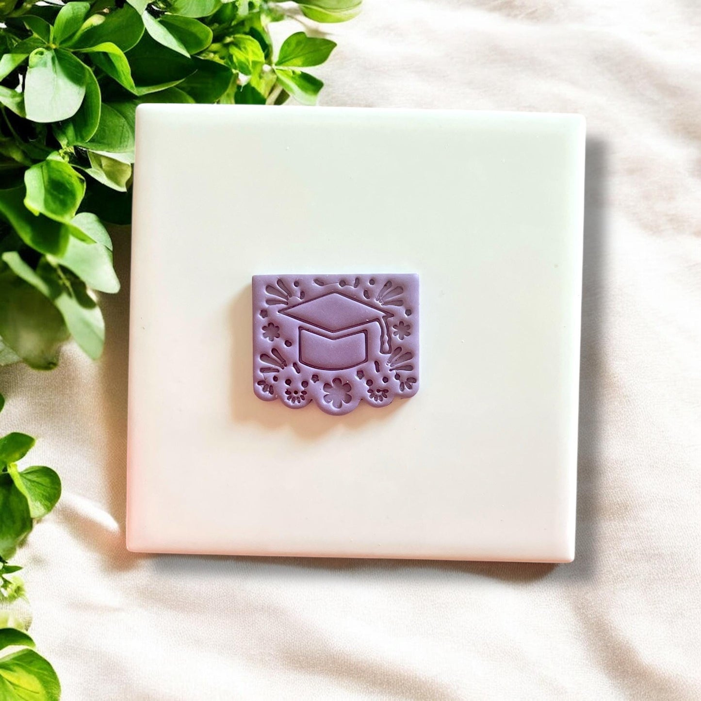 Graduation cutter with floral design