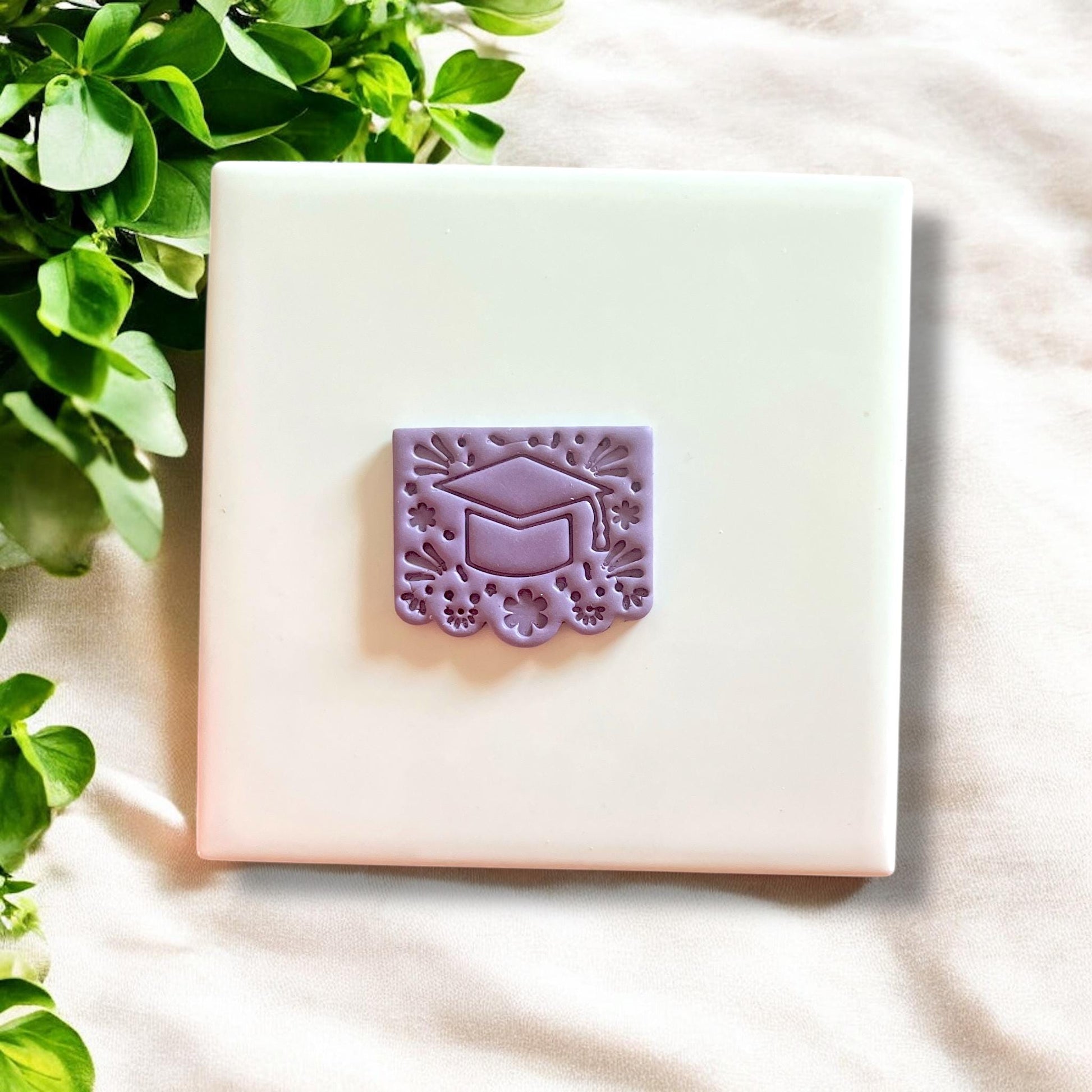Graduation cutter with floral design