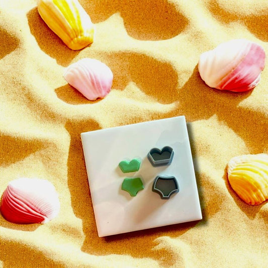 Bathing suit clay cutter mold with bikini top and bottom designs, perfect for polymer clay earrings.