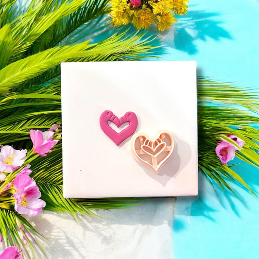 Flamingo heart clay earring cutter next to cut pink piece