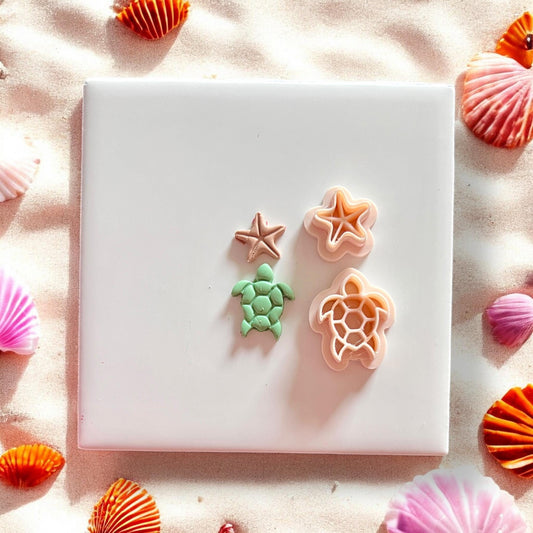 Clay cutters and completed turtle and starfish earrings shown side by side