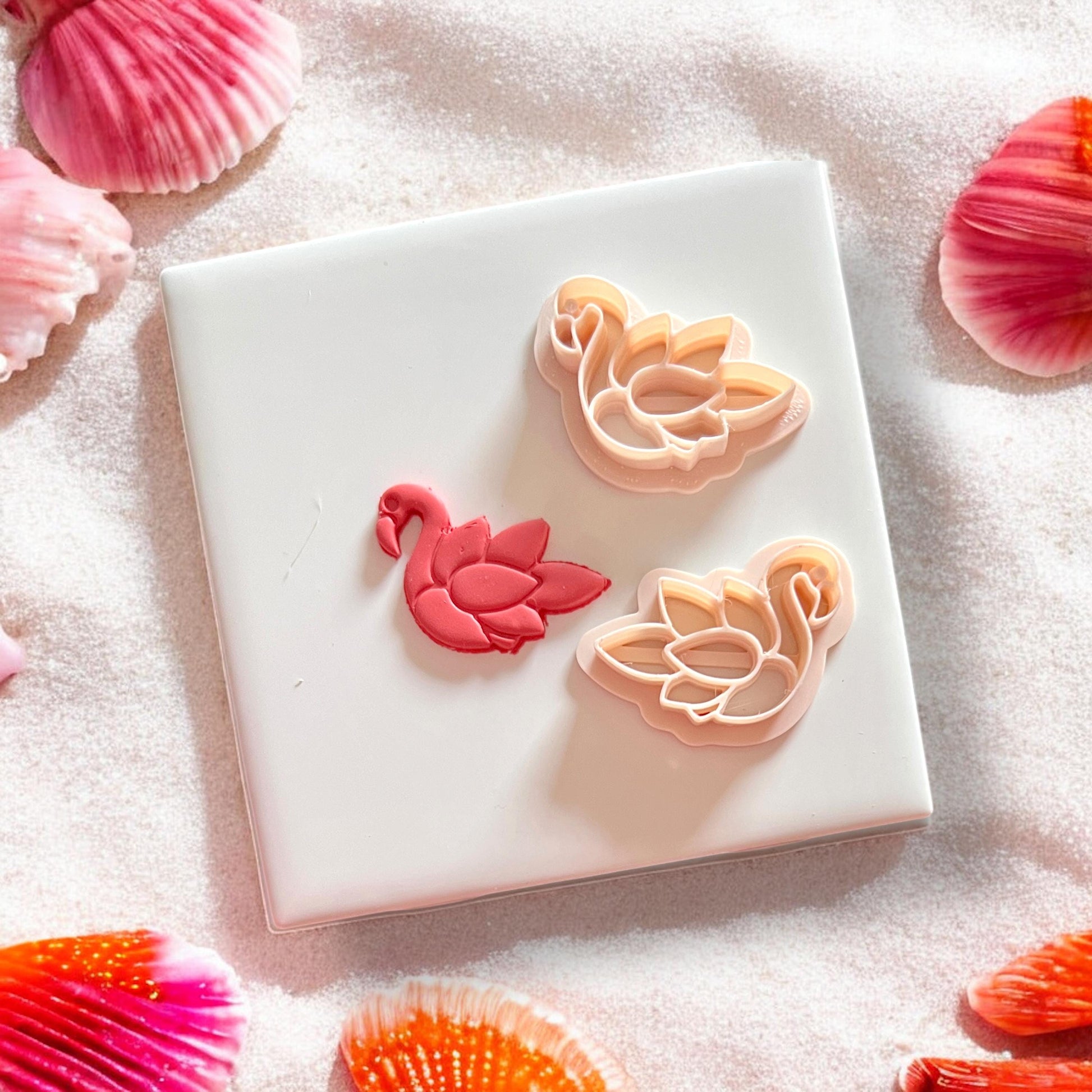 Flamingo clay cutter shown next to shaped clay result