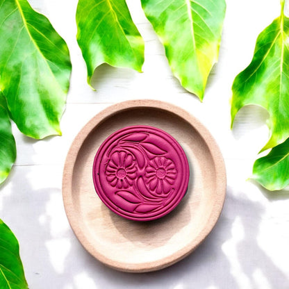 Top view of floral clay cutter showing intricate daisy and leaf design
