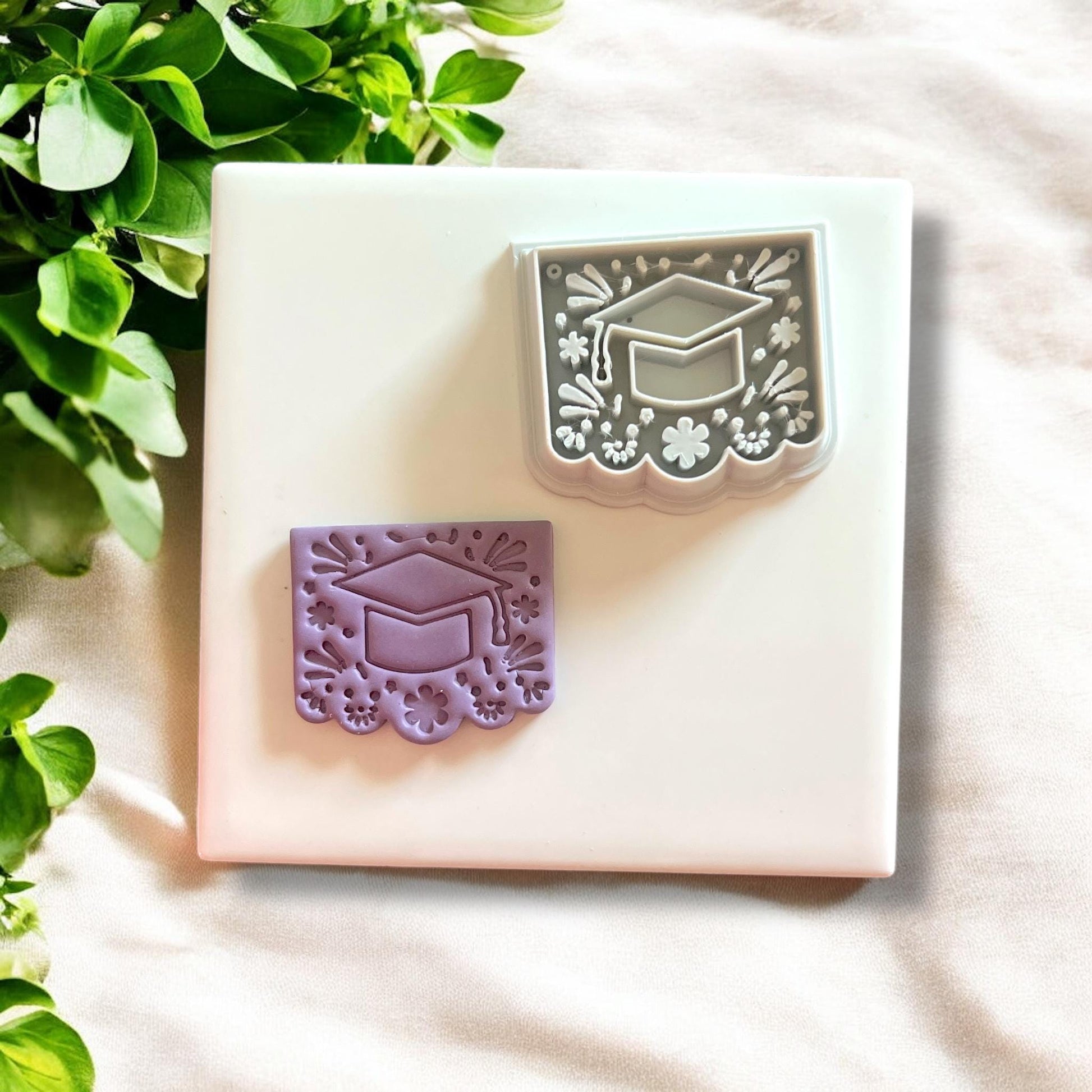 Papel picado graduation earring mold