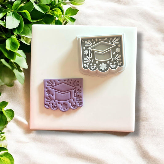Papel picado graduation earring mold
