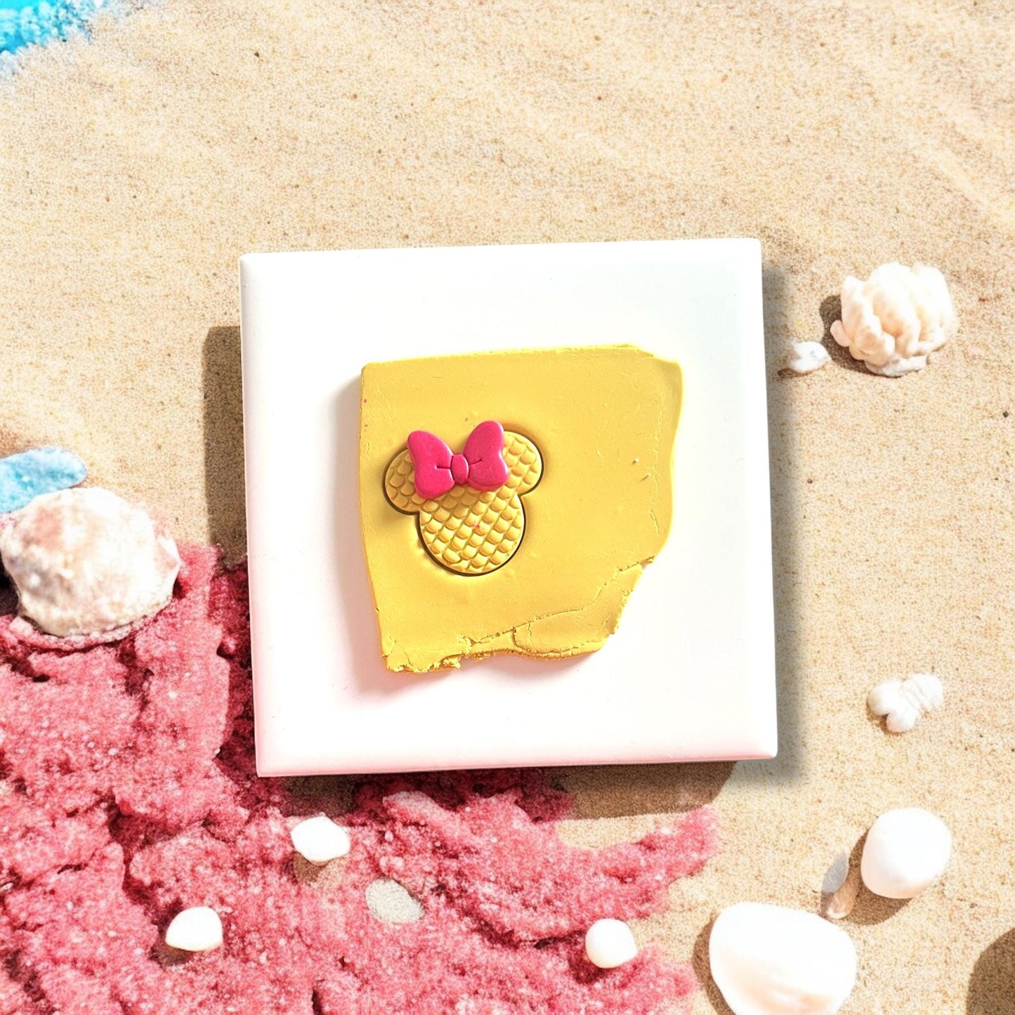 beach mouse cutter with bow on yellow clay