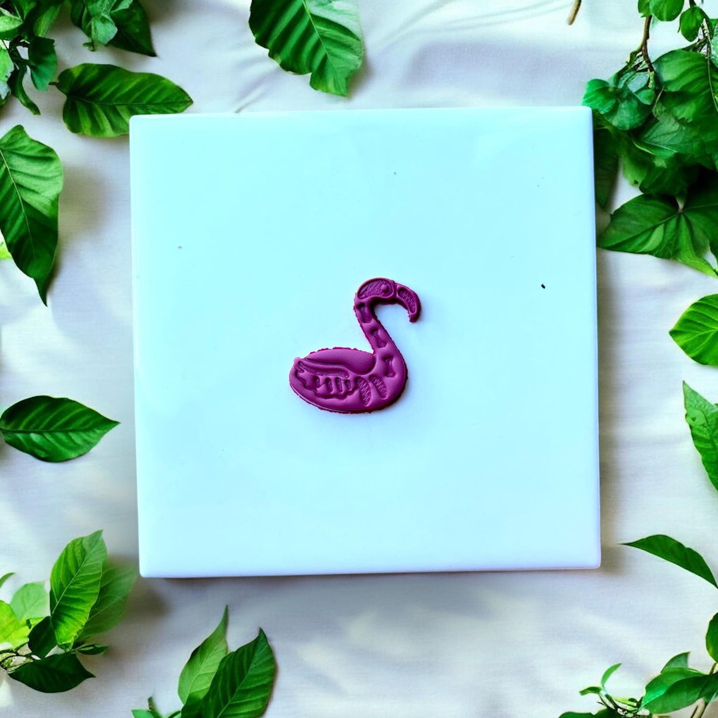 small purple flamingo skeleton polymer clay piece