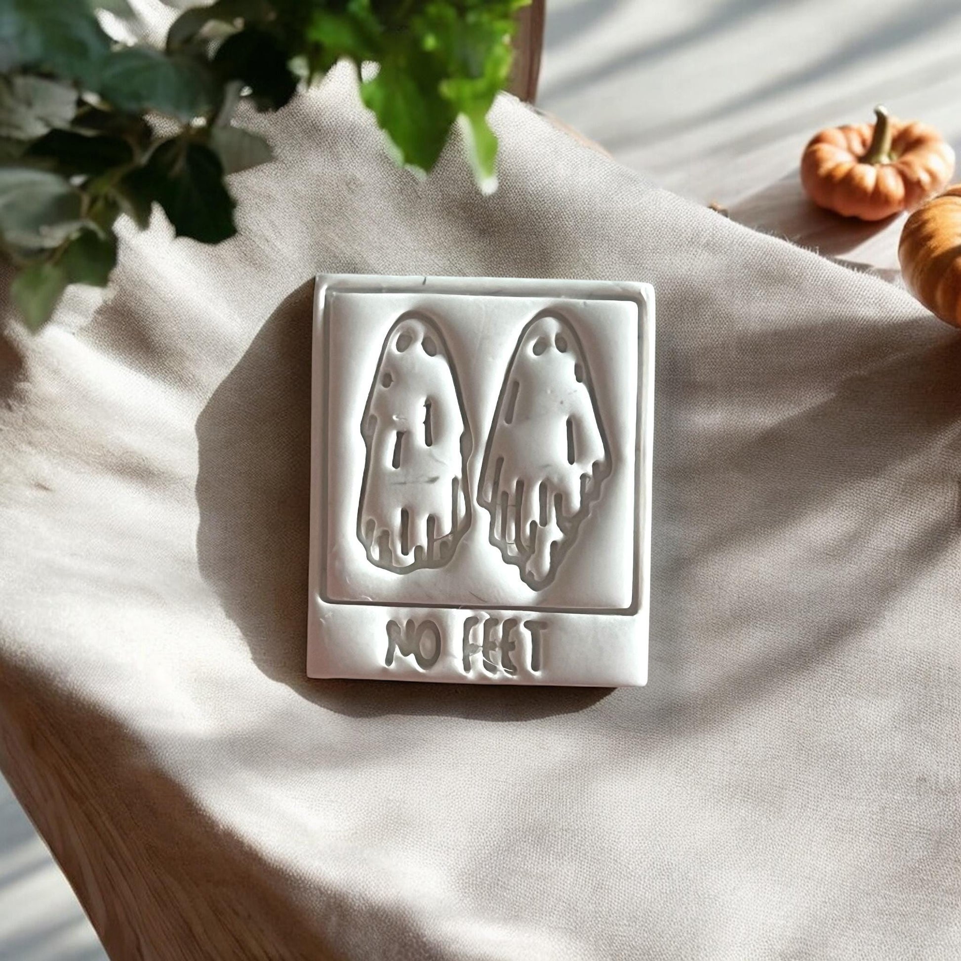 No Feet ghost clay piece close-up