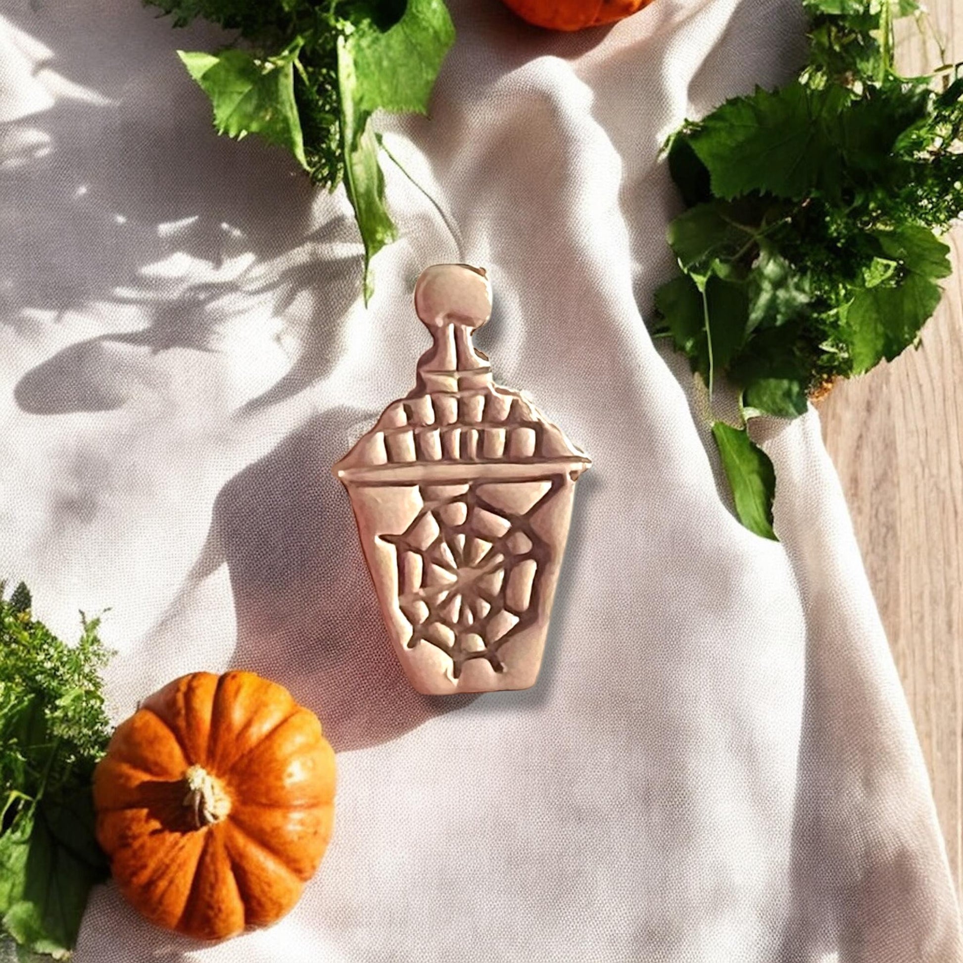 Lantern clay piece with spider web detail