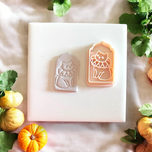 Halloween cat clay slab and matching cutter displayed together