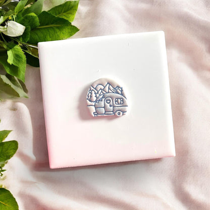 mountain camper clay on plate with herbs