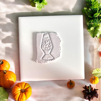 Ghost lava lamp impression with pumpkins and leaves