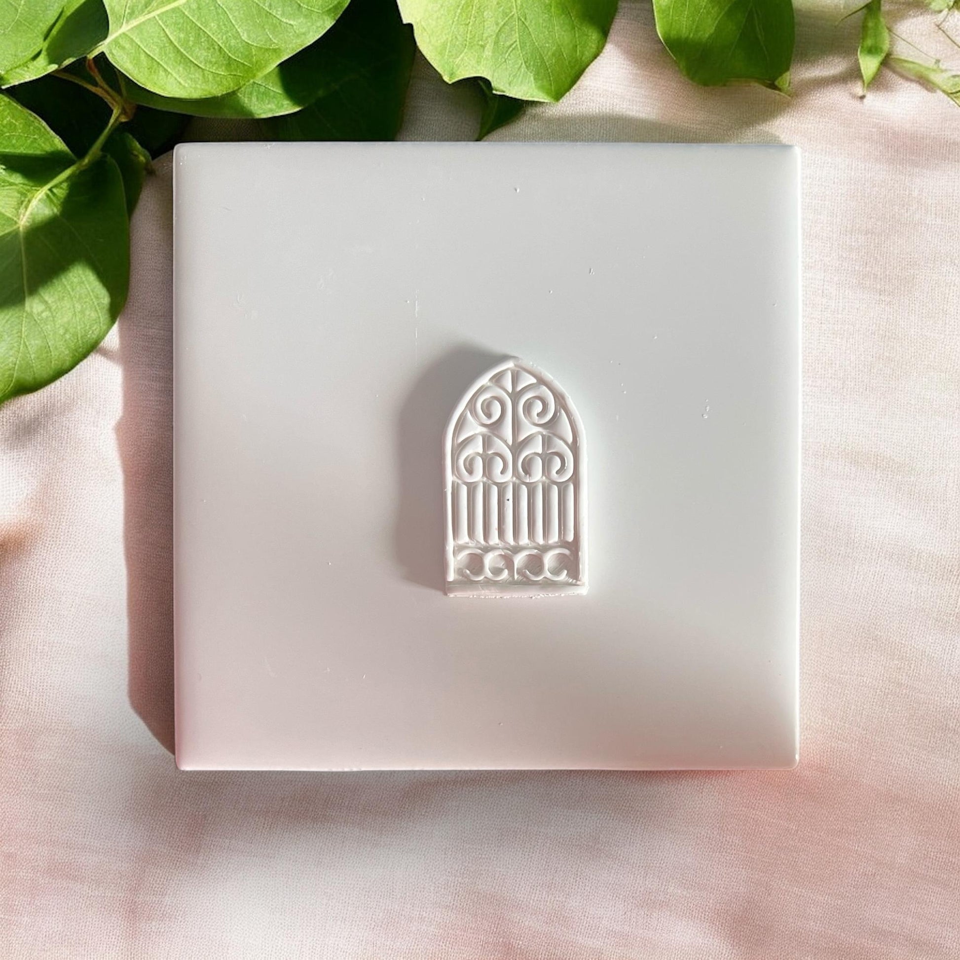 cutter and imprint of arched gothic gate design