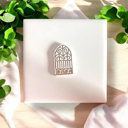 white clay gate imprint with soft shadows