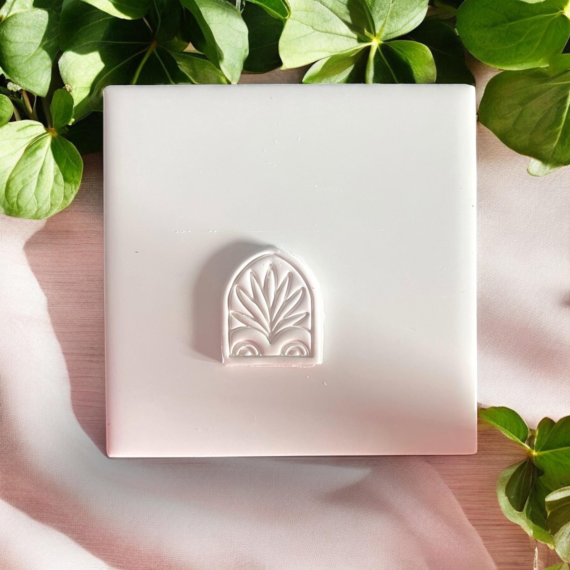 Clay impression of Palm Scroll Window earring design