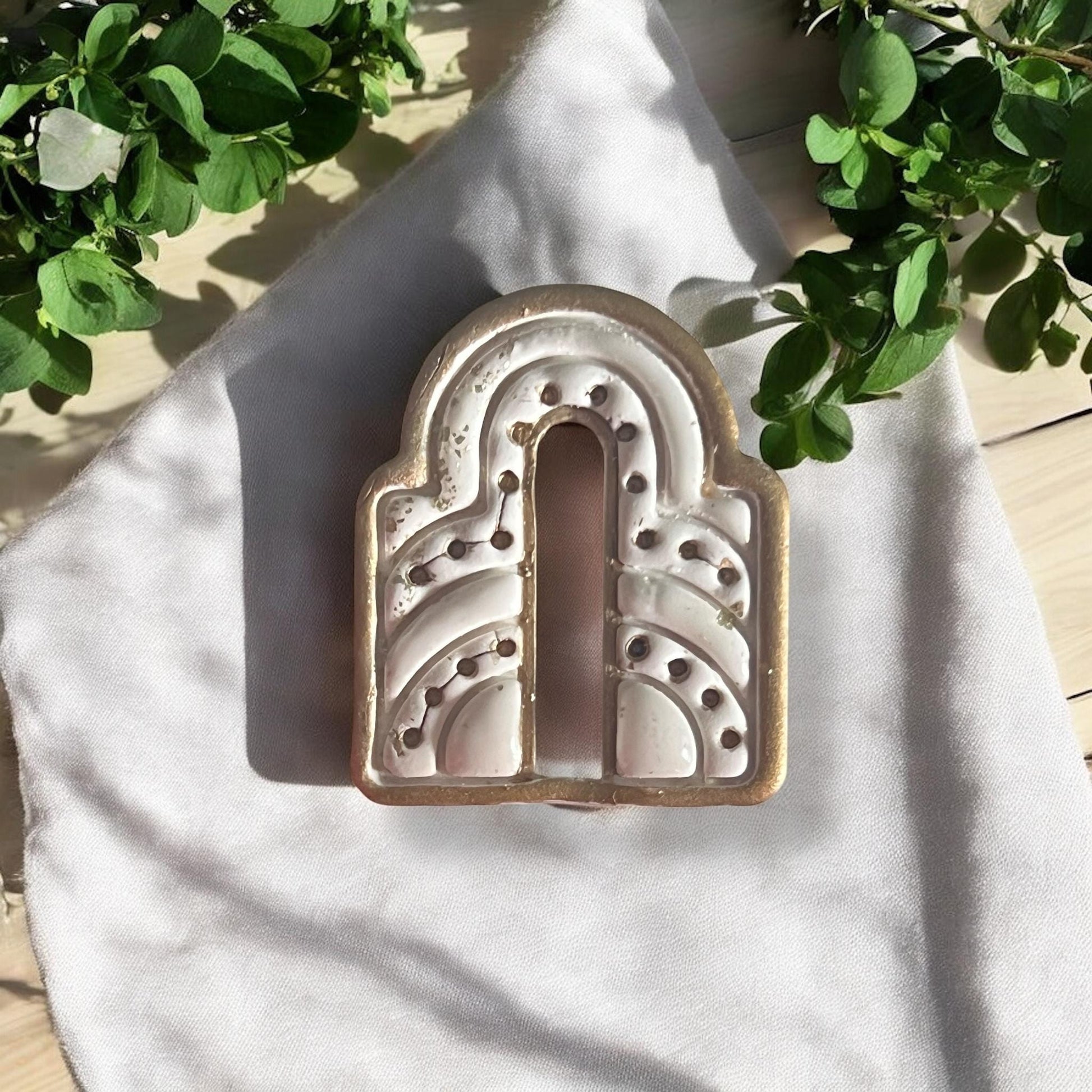 Finished earring with metallic detail