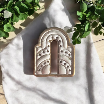 Finished earring with metallic detail