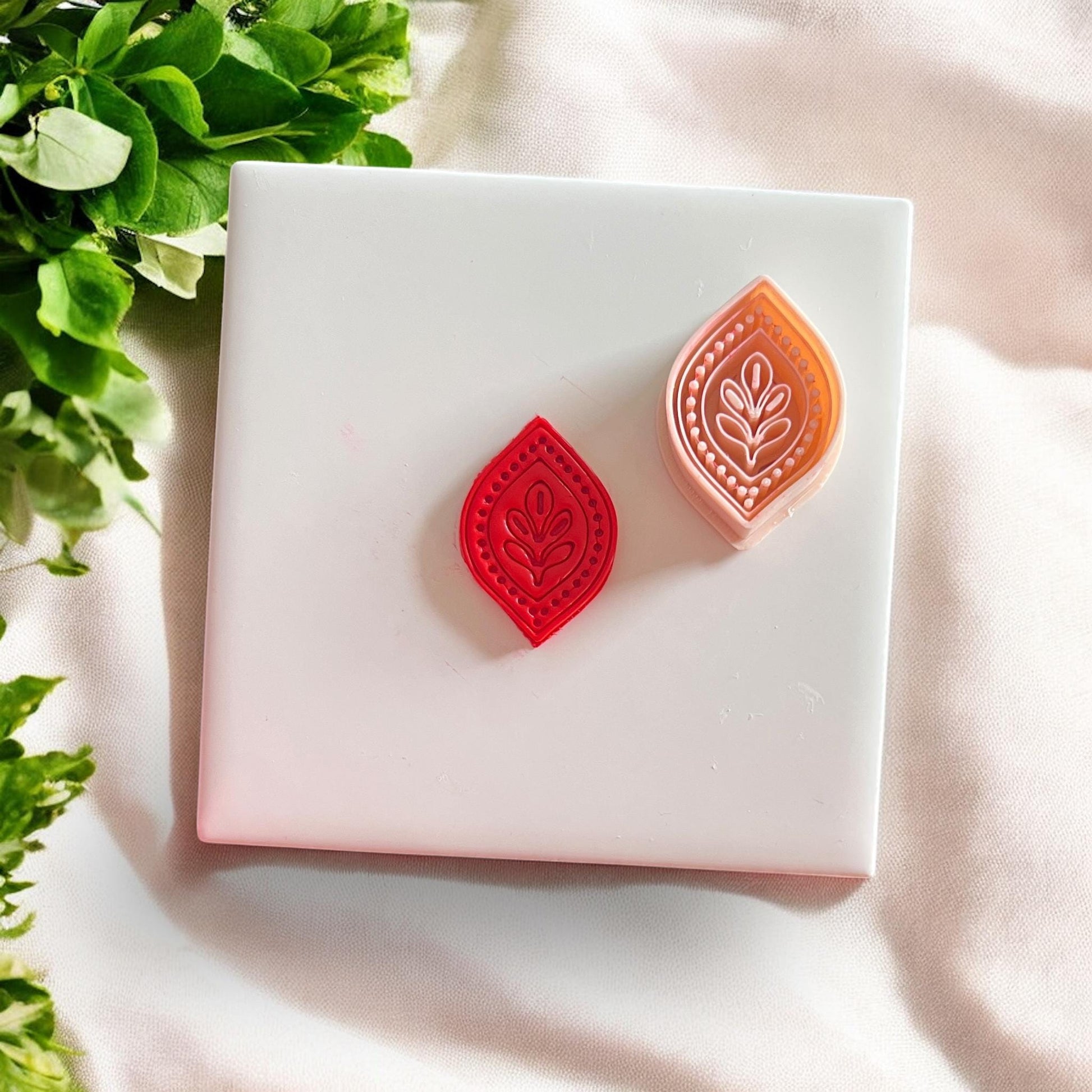 Side-by-side image of cut clay piece and matching cutter