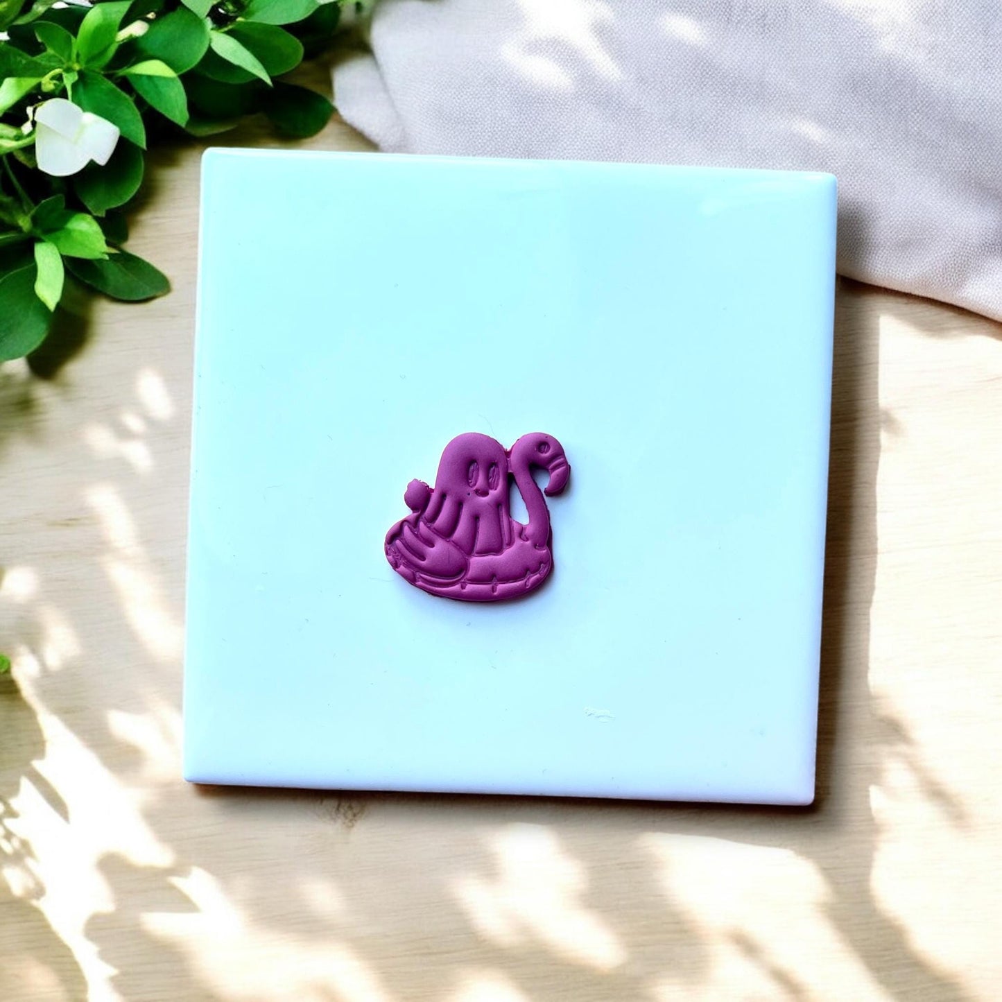 Ghost flamingo floatie polymer clay cutout