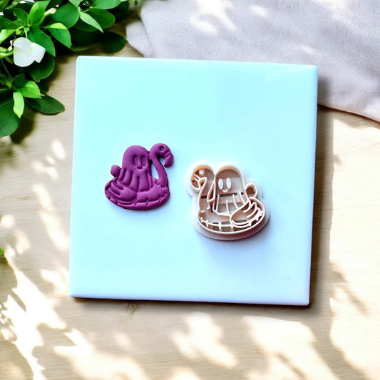 Ghost floatie earring shape with cutter shown