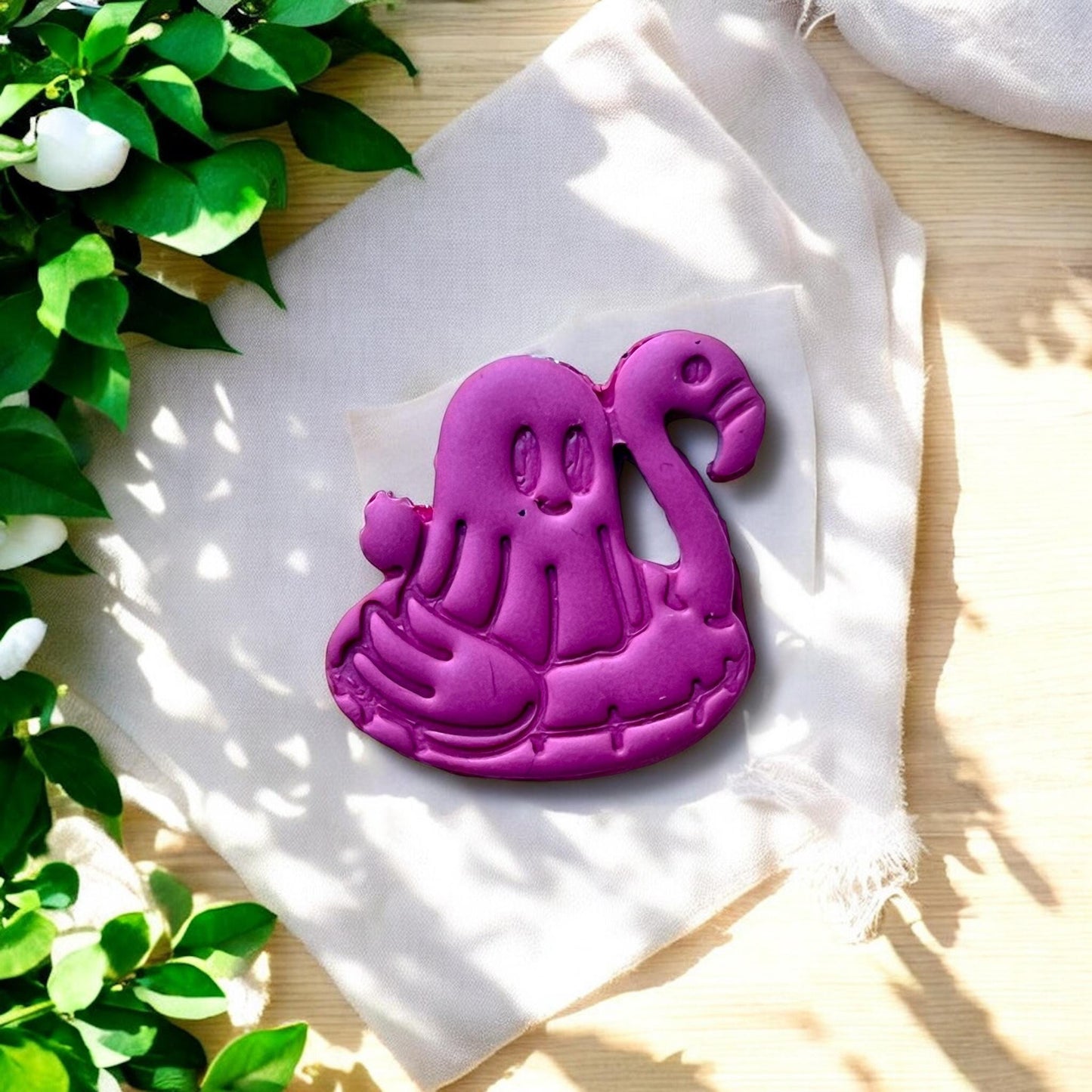Finished clay piece of ghost on pool floatie